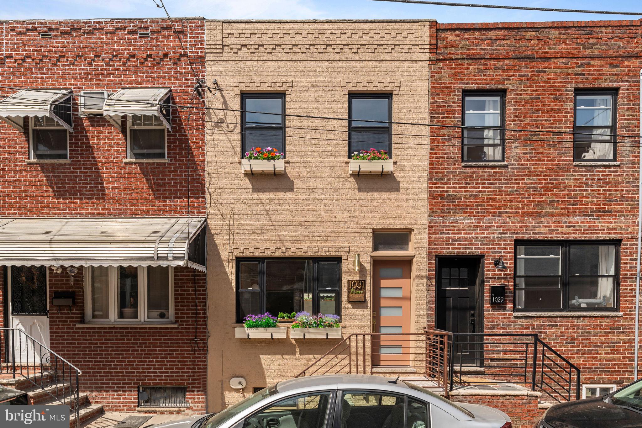 a front view of a building with balcony
