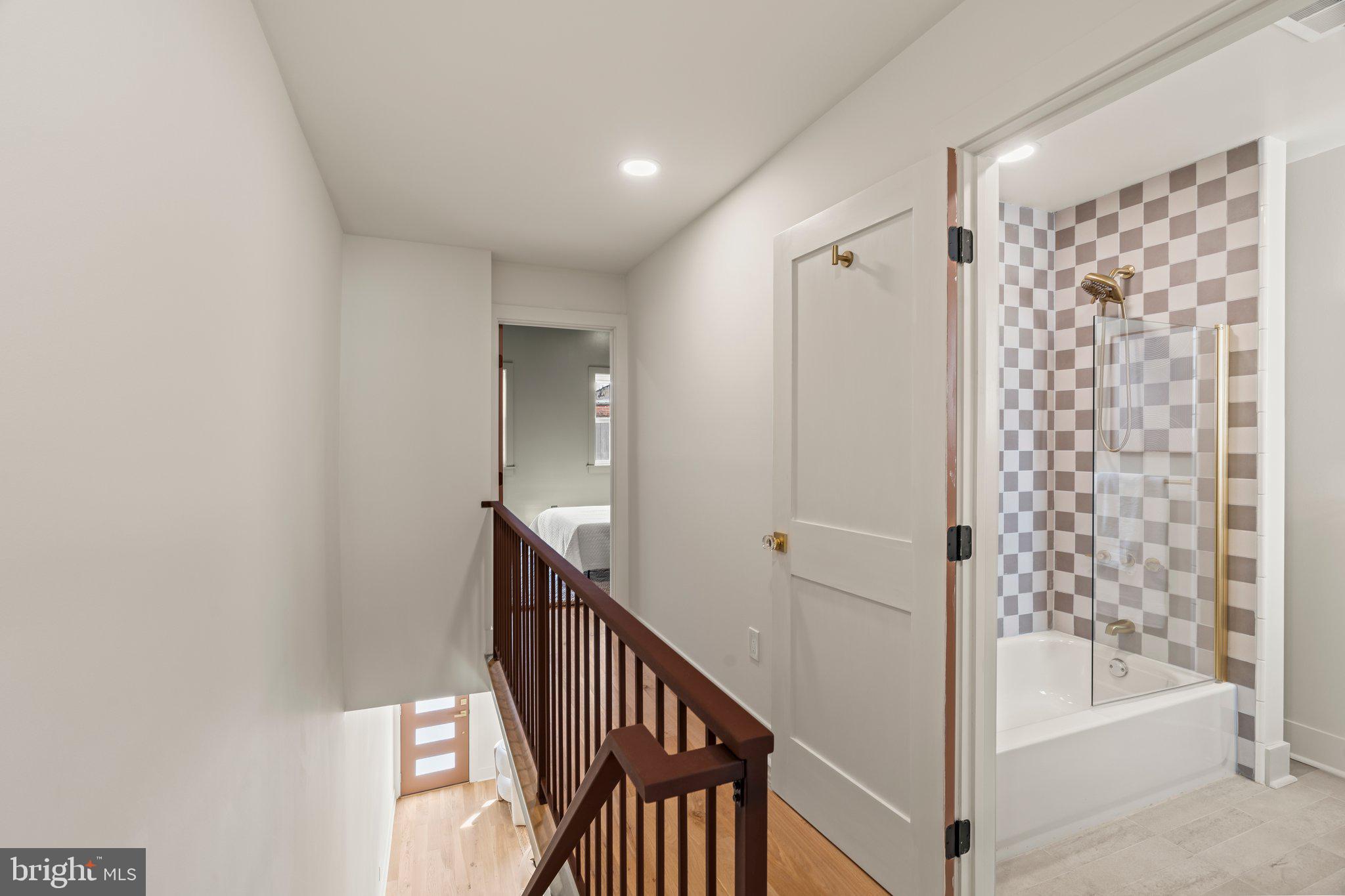 1031 Mercy Street Philadelphia, PA 19148 - Photo 20 of 34 a view of a hallway with wooden floor and entryway