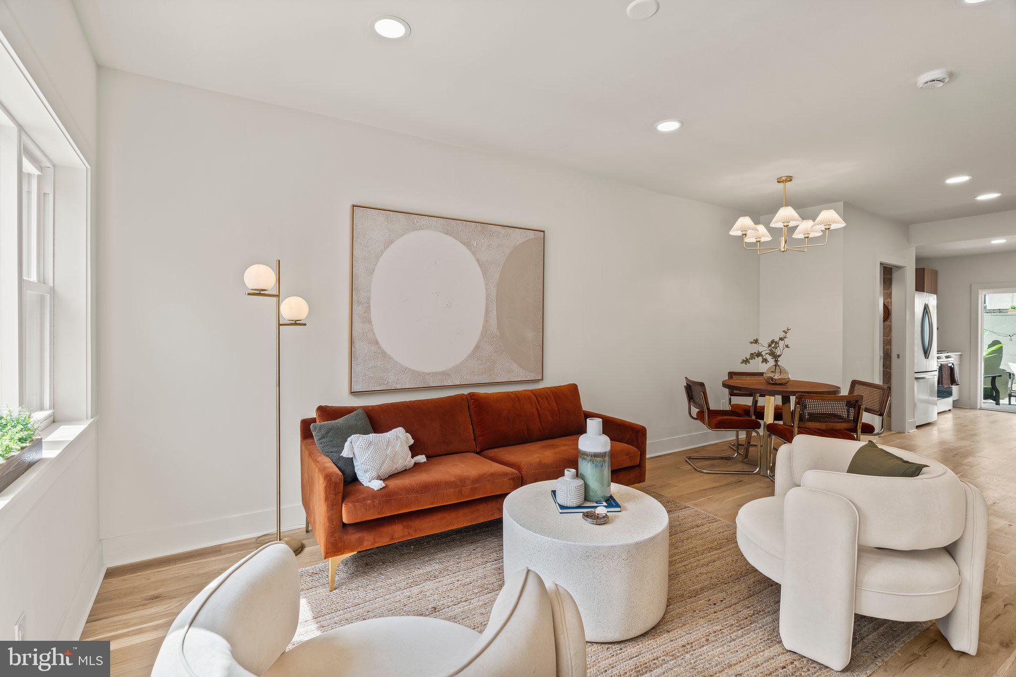1031 Mercy Street Philadelphia, PA 19148 - Photo 2 of 34 a living room with furniture and a wooden floor