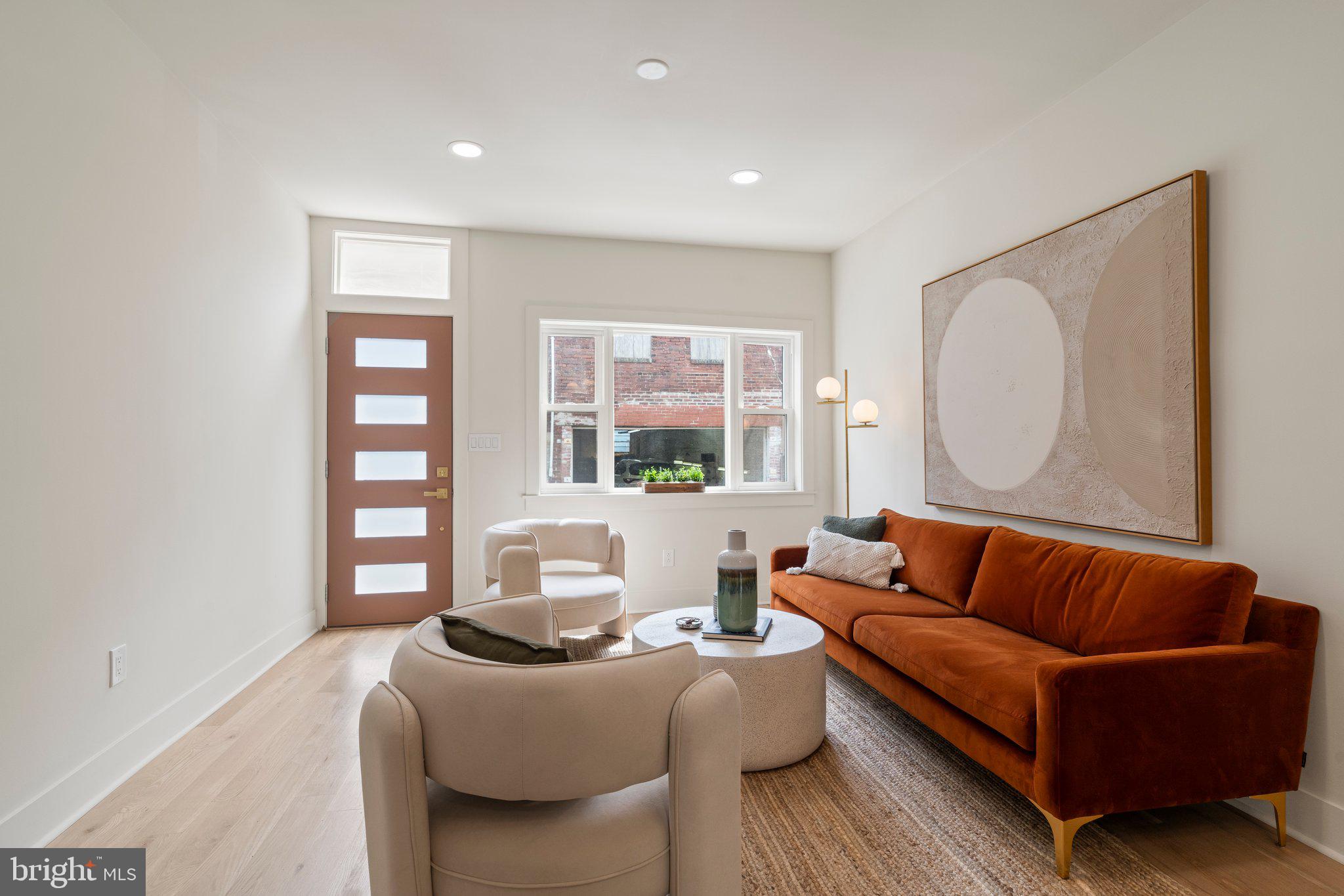 1031 Mercy Street Philadelphia, PA 19148 - Photo 3 of 34 a living room with furniture and a window