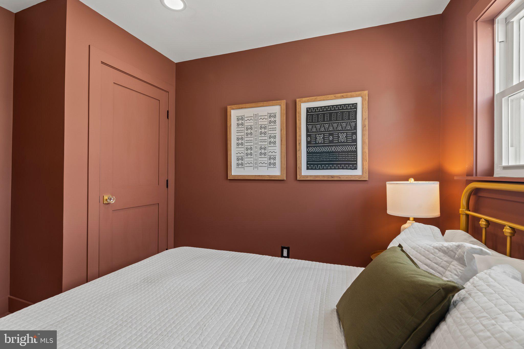 1031 Mercy Street Philadelphia, PA 19148 - Photo 32 of 34 a bedroom with a bed and a window