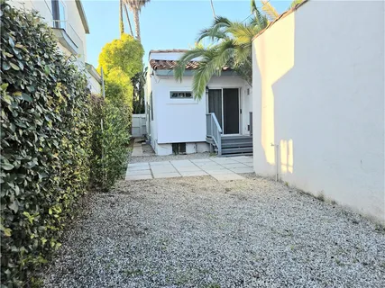 a view of a house with a street