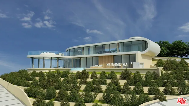 an aerial view of a house having yard