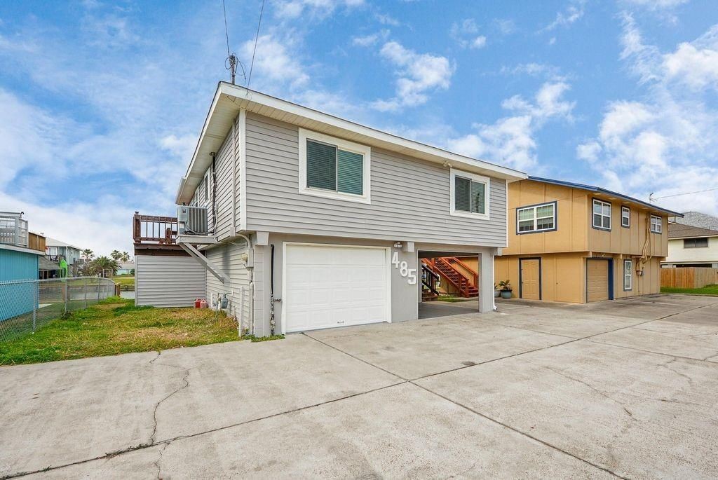 485 Pompano Street Bayou Vista, TX 77563 - Photo 30 of 32 a view of a house with a patio