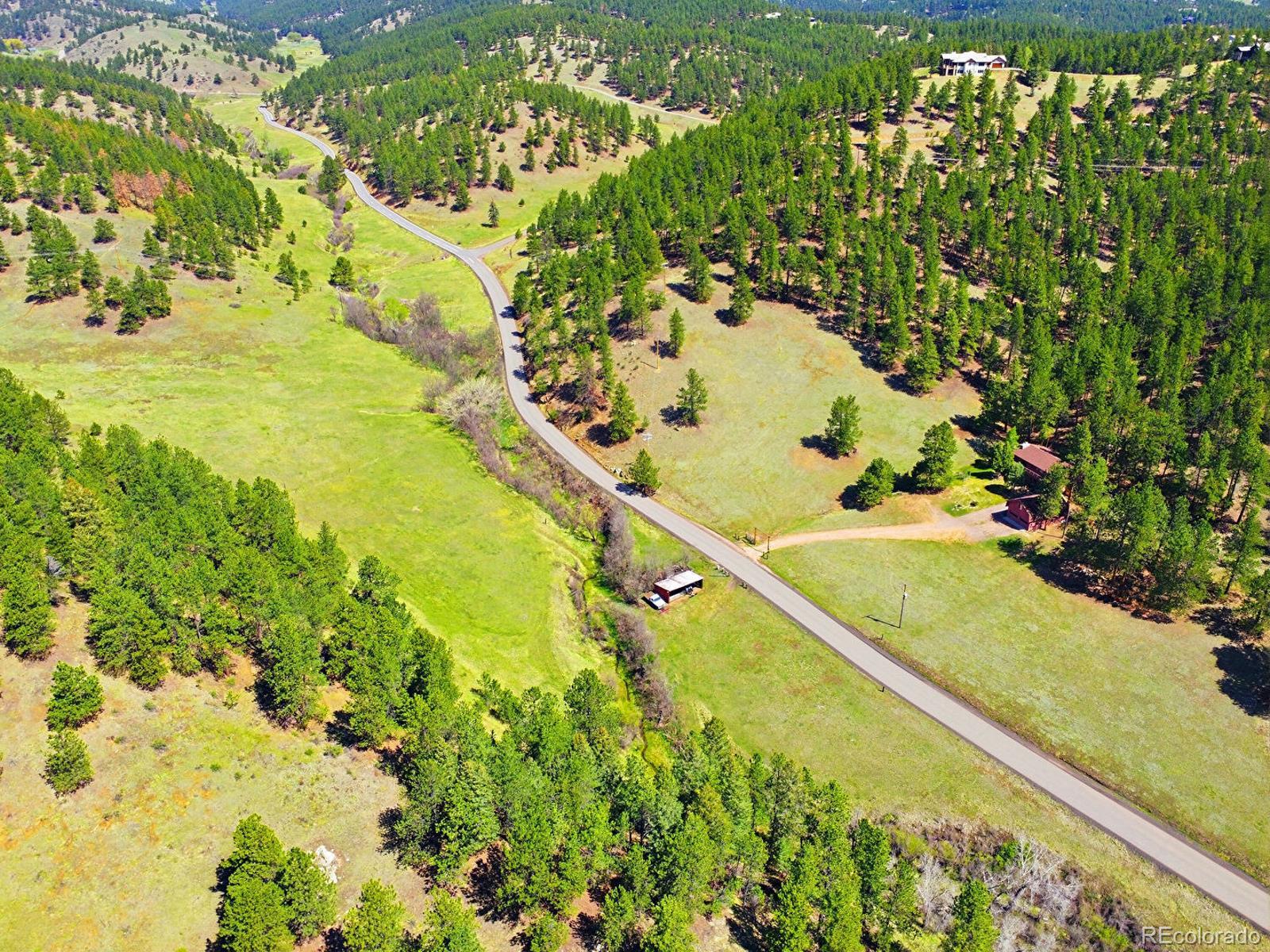 2830 Kerr Gulch Road Evergreen, CO 80439 - Photo 39 of 48 a view of an ocean and a mountain