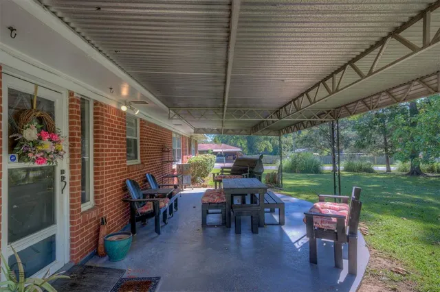 a view of backyard with green space