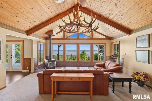 a view of a livingroom with a couch and fireplace