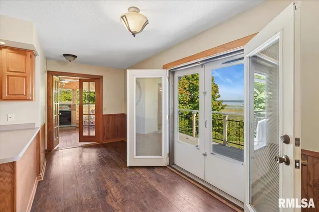 a outdoor space with sliding door and wooden floor