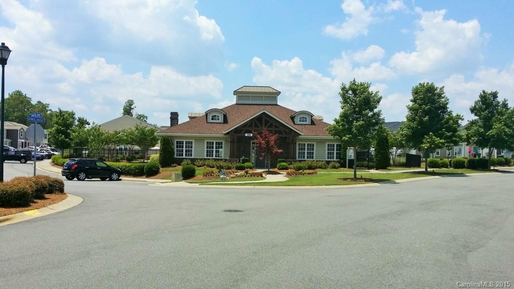290 River Clay Road, Unit 222 Fort Mill, SC 29708 - Photo 12 of 12 a view of swimming pool with outdoor seating and trees in the background