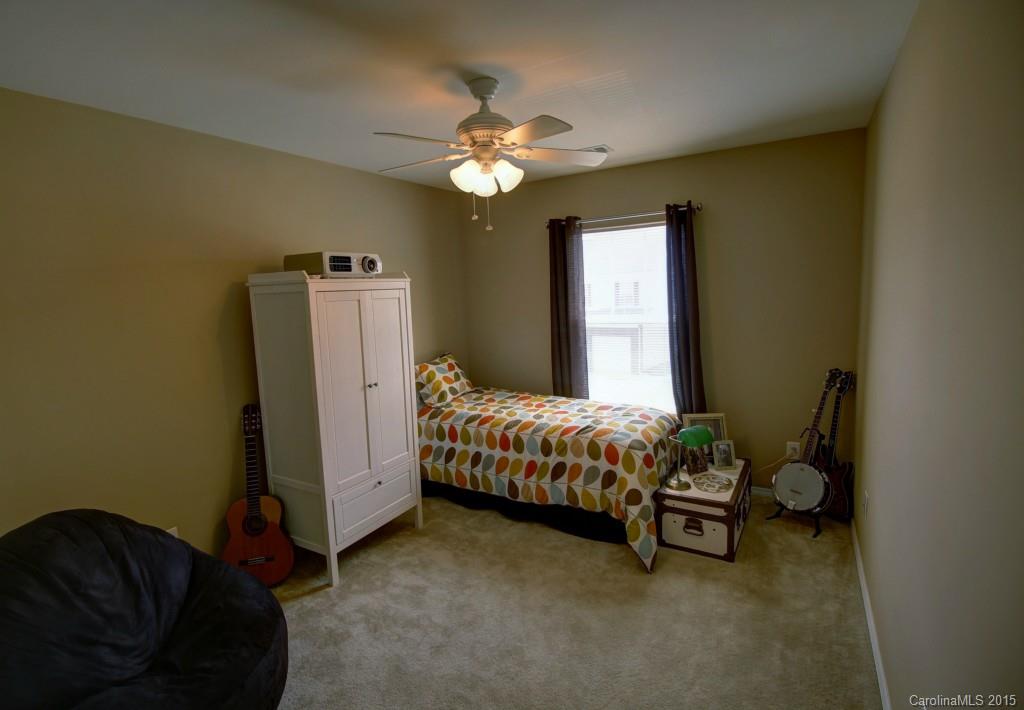 290 River Clay Road, Unit 222 Fort Mill, SC 29708 - Photo 7 of 12 a bedroom with bed and a window