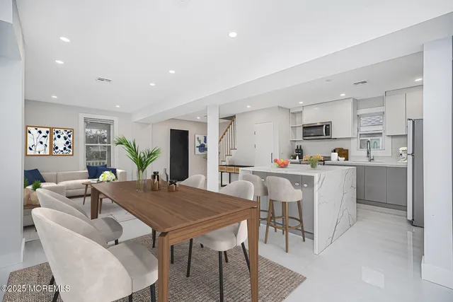 a view of kitchen with cabinets and wooden floor