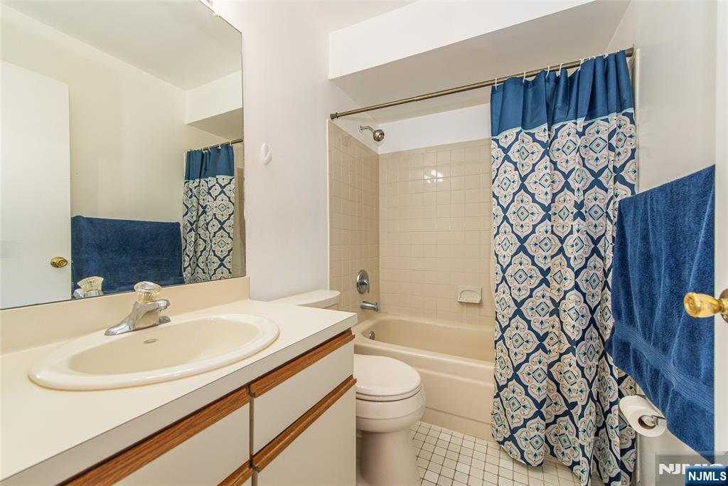 7 Drake Lane Roxbury Township, NJ 07852 - Photo 17 of 35 a bathroom with a sink a toilet and shower