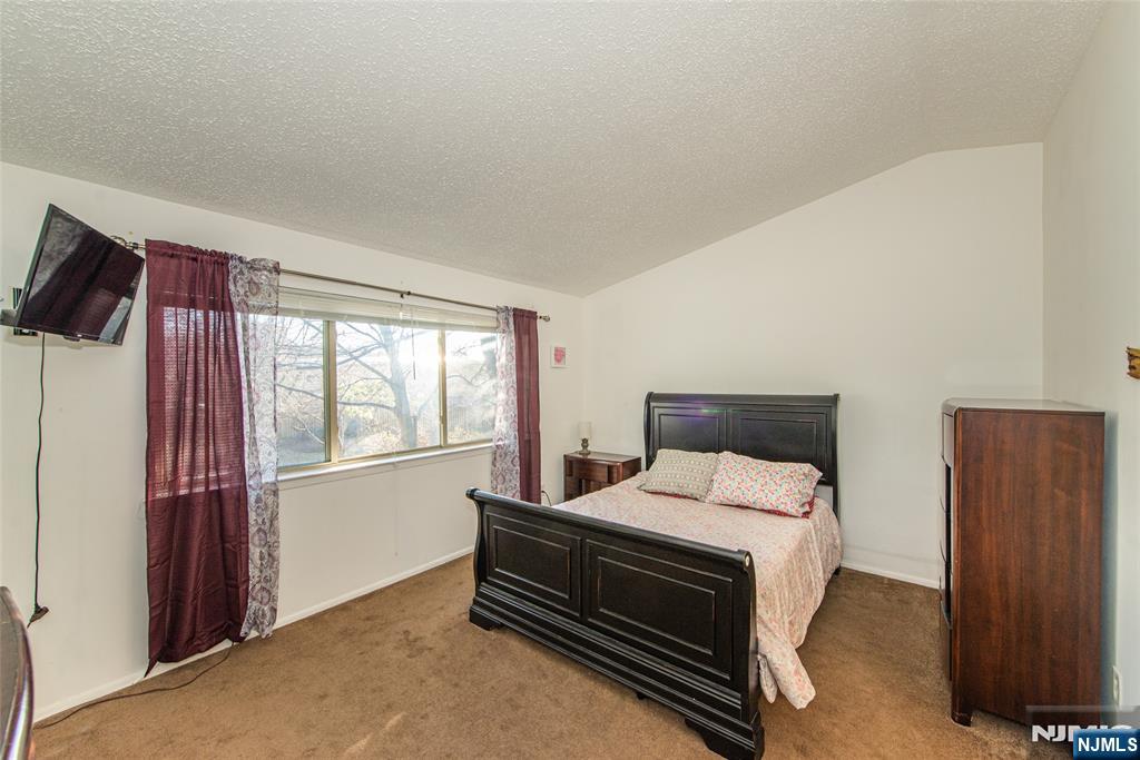 7 Drake Lane Roxbury Township, NJ 07852 - Photo 18 of 35 a bedroom with a bed and a window
