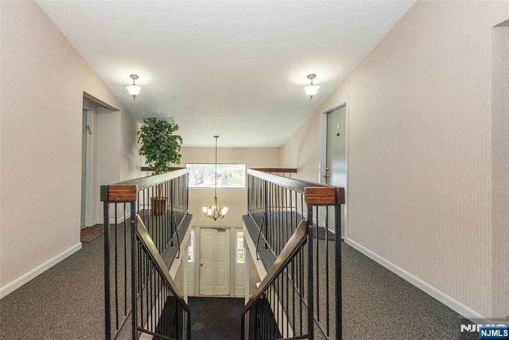 7 Drake Lane Roxbury Township, NJ 07852 - Photo 2 of 35 a view of a hallway with seating area