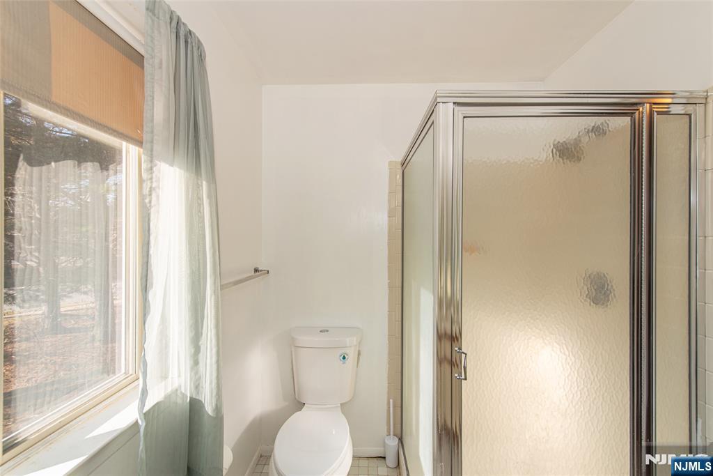 7 Drake Lane Roxbury Township, NJ 07852 - Photo 21 of 35 a bathroom with a shower and a toilet