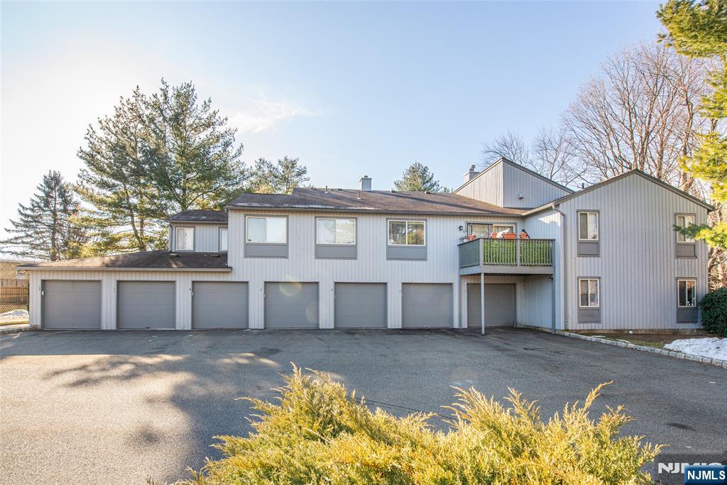 7 Drake Lane Roxbury Township, NJ 07852 - Photo 27 of 35 a view of a house with a swimming pool and a yard