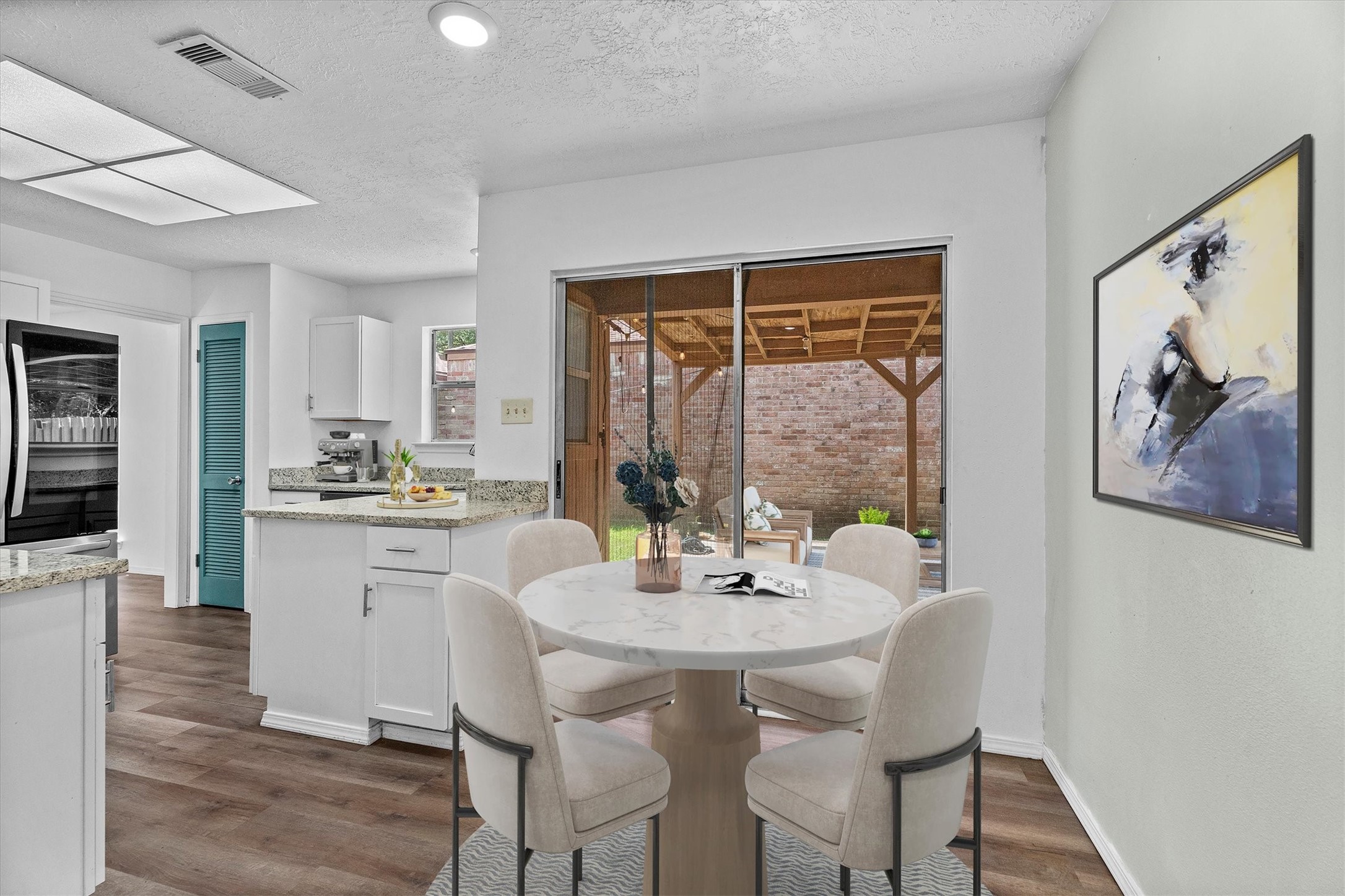 6631 Ambler Drive Spring, TX 77379 - Photo 7 of 37 a view of a dining room with furniture window and wooden floor