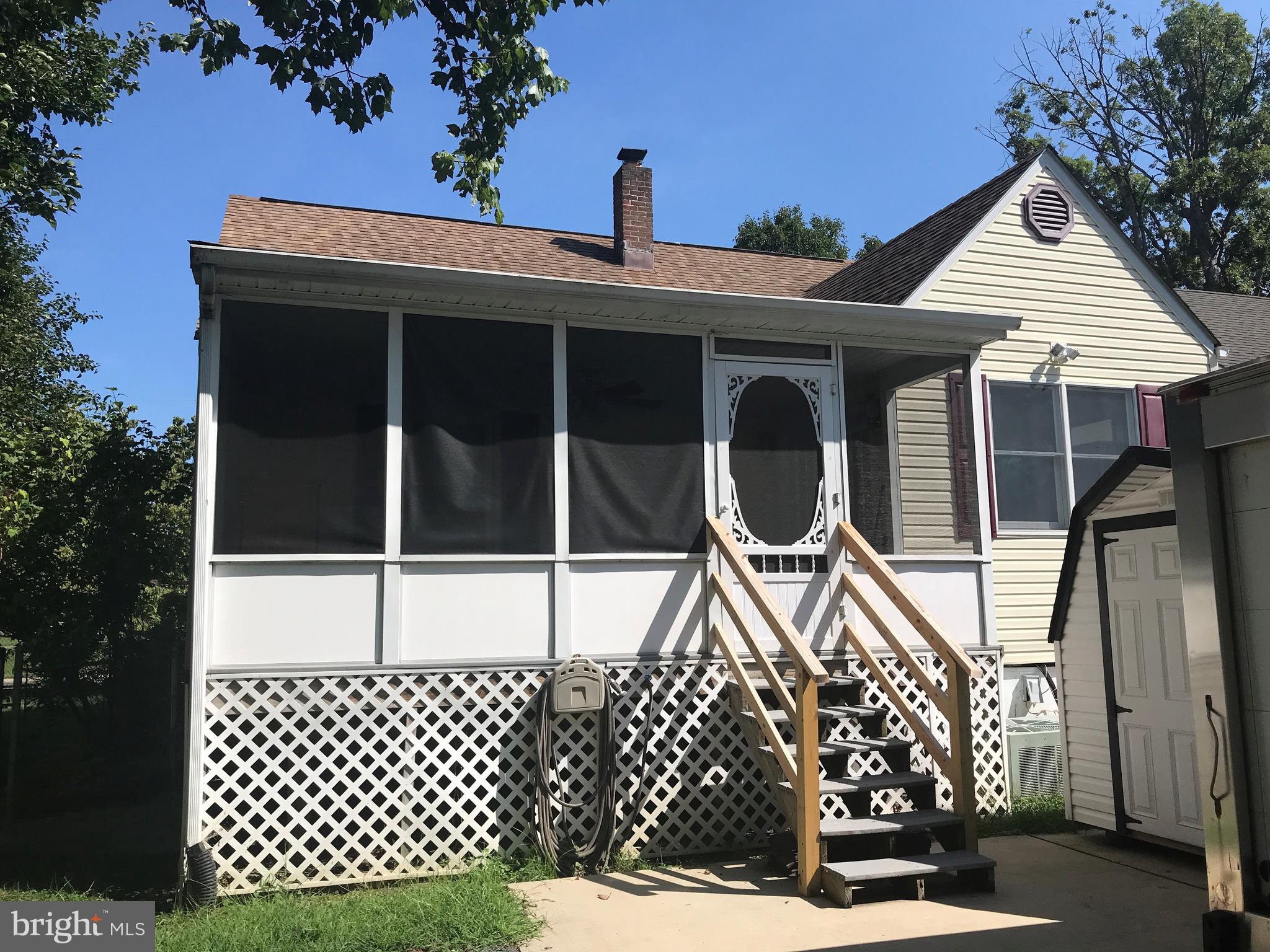 297 Townsend Road Essex, MD 21221 - Photo 29 of 39 Screened porch and patio