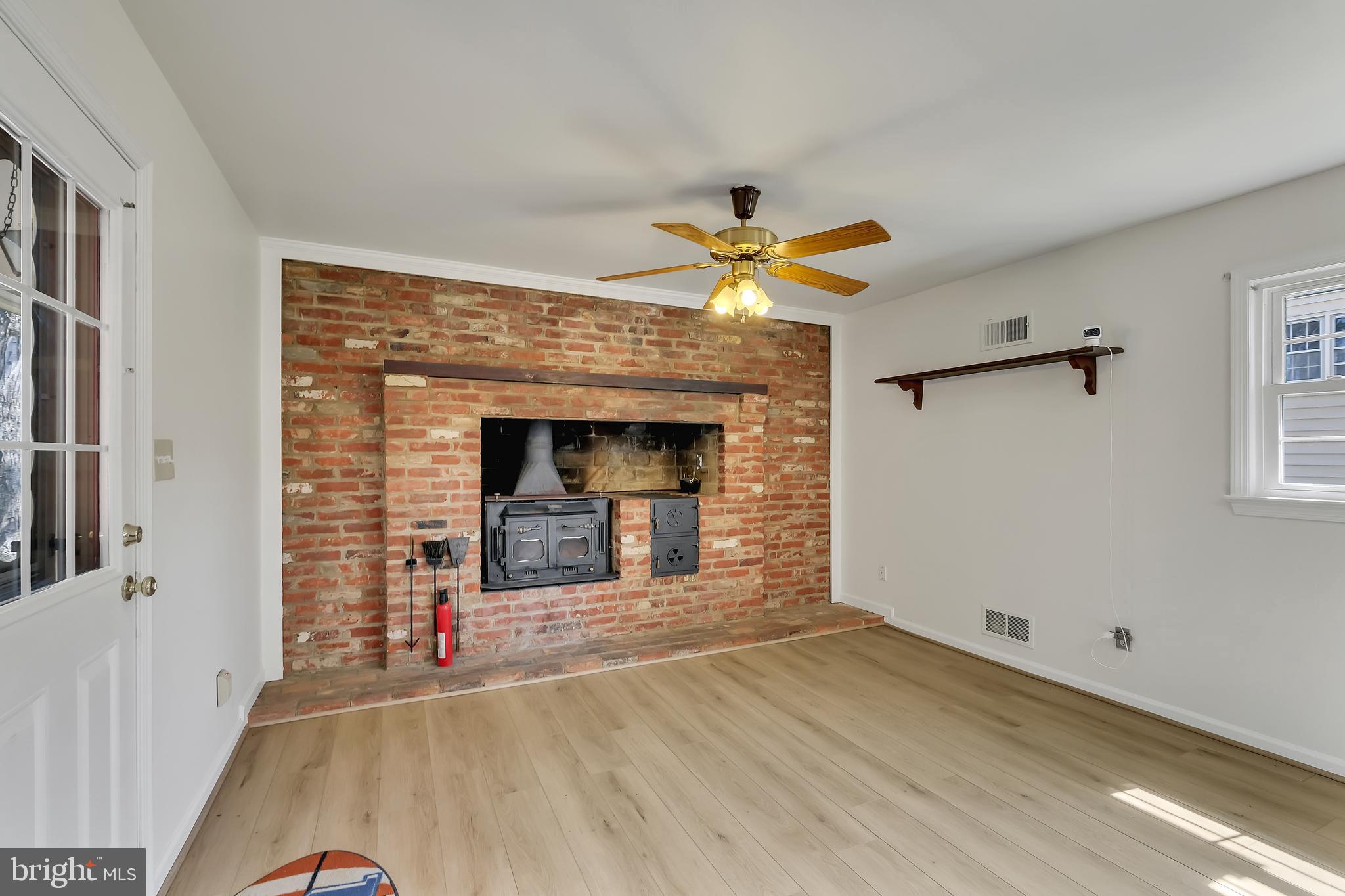 14212 Rippling Brook Drive Silver Spring, MD 20906 - Photo 12 of 38 woodstove in kitchen