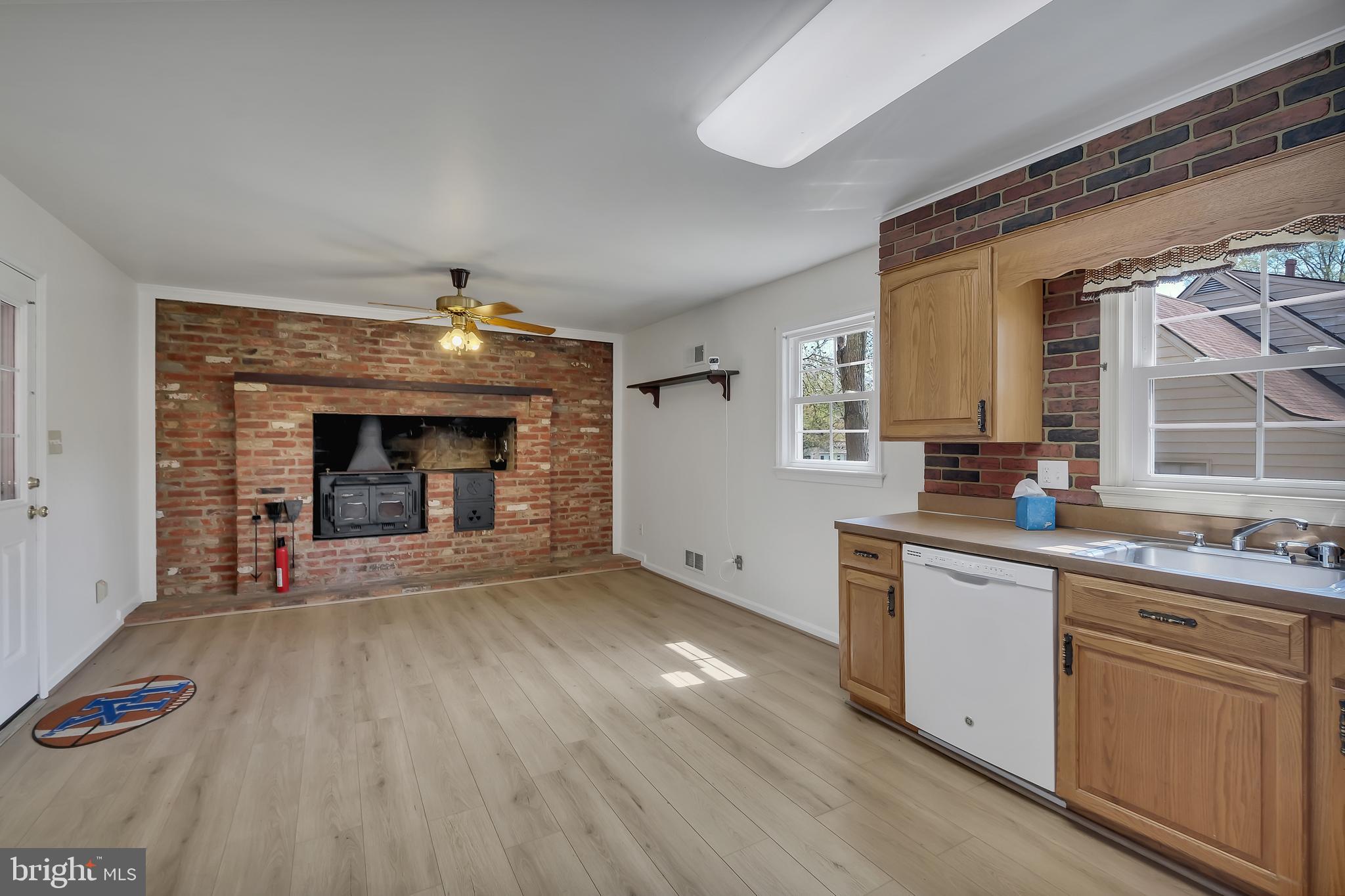 14212 Rippling Brook Drive Silver Spring, MD 20906 - Photo 14 of 38 kitchen/dining with wood stove