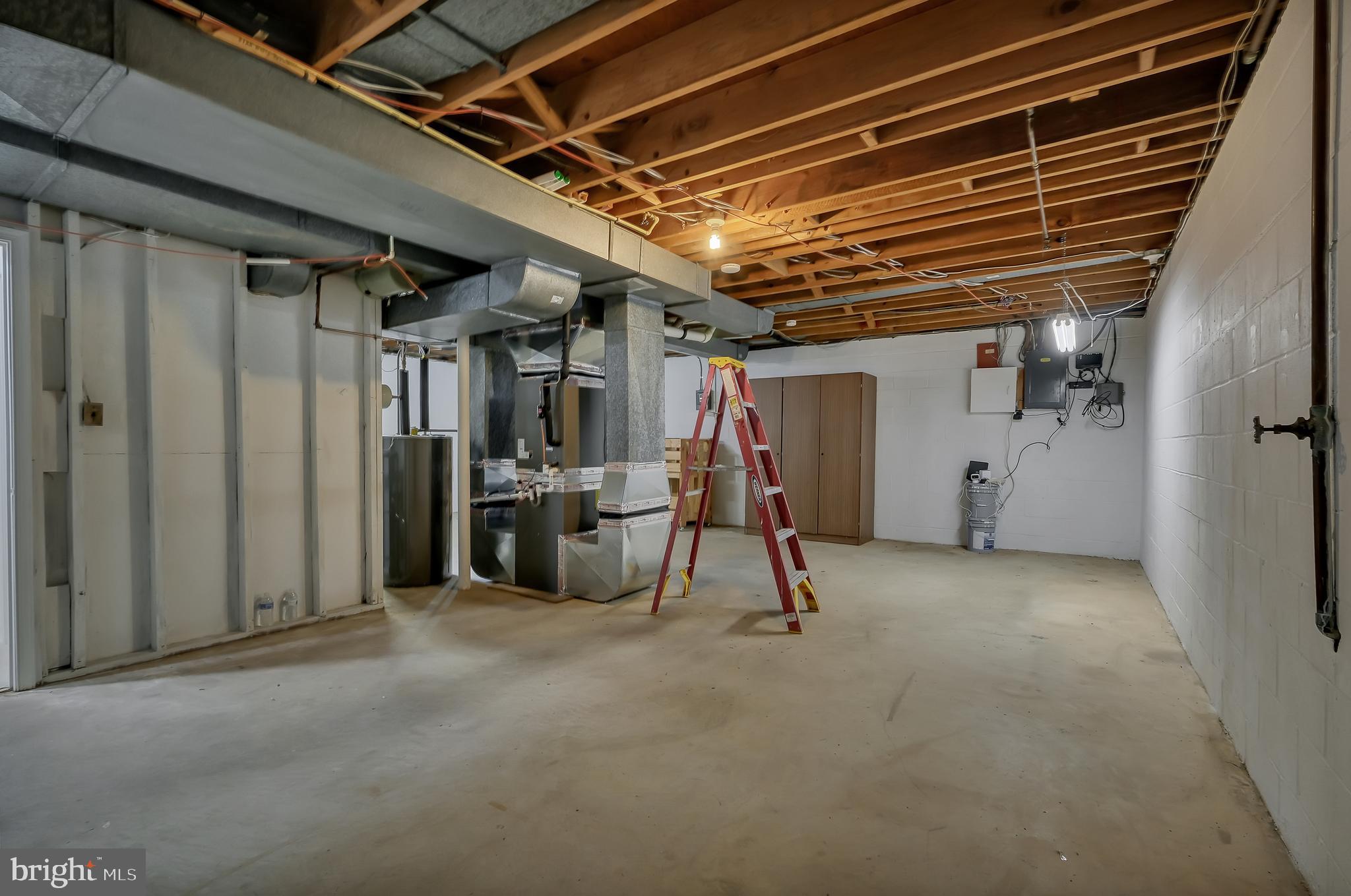 14212 Rippling Brook Drive Silver Spring, MD 20906 - Photo 28 of 38 basement storage and or workshop/laundry