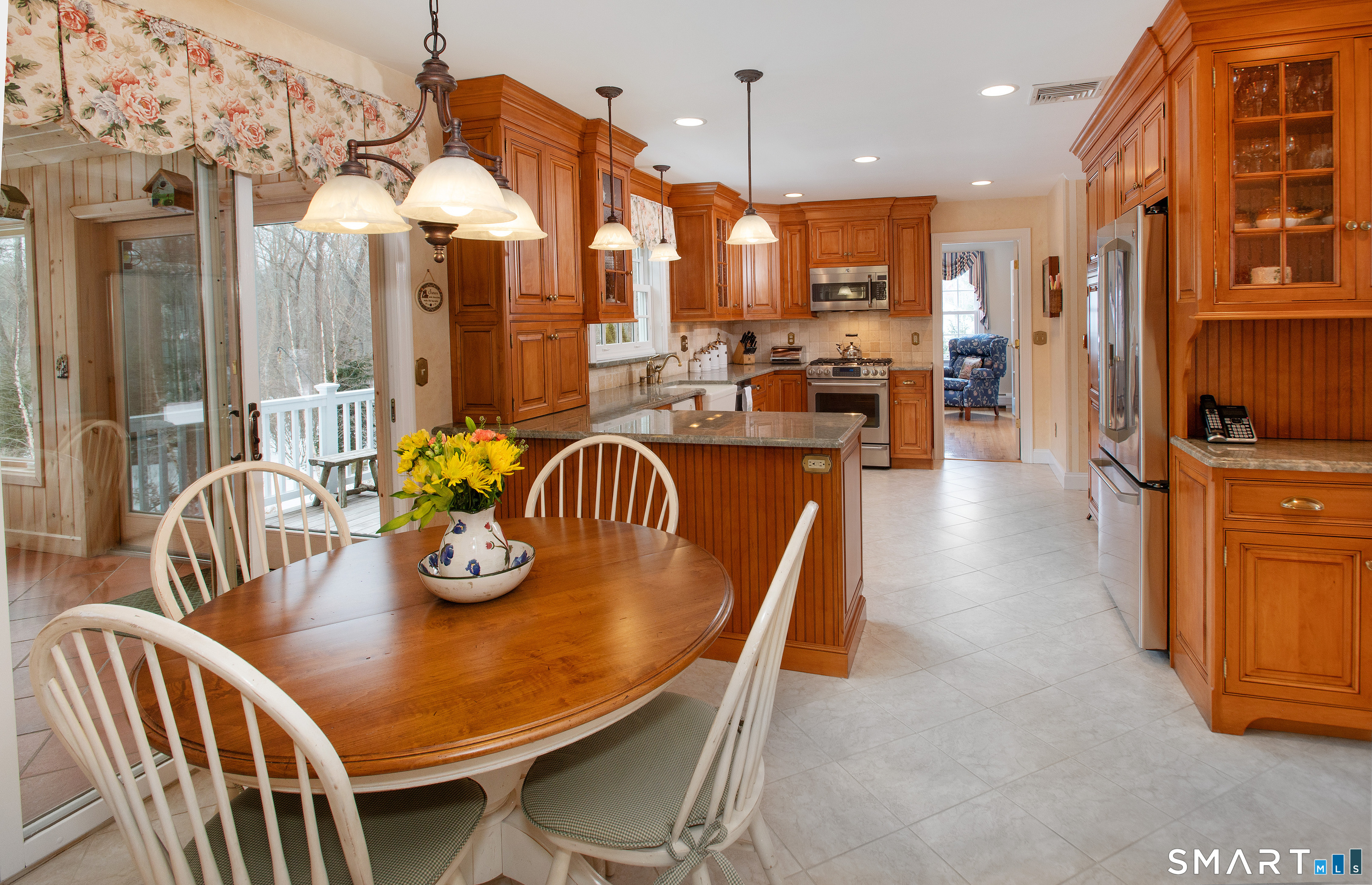 15 Twopence Road Ridgefield, CT 06877 - Photo 15 of 42 a view of a dining room with furniture