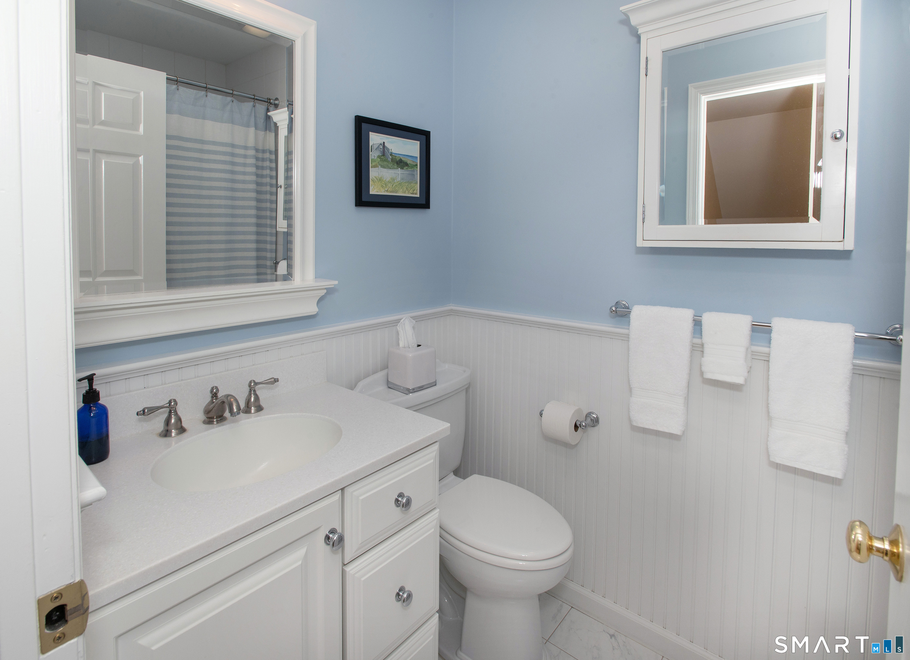 15 Twopence Road Ridgefield, CT 06877 - Photo 26 of 42 a bathroom with a sink mirror vanity and toilet