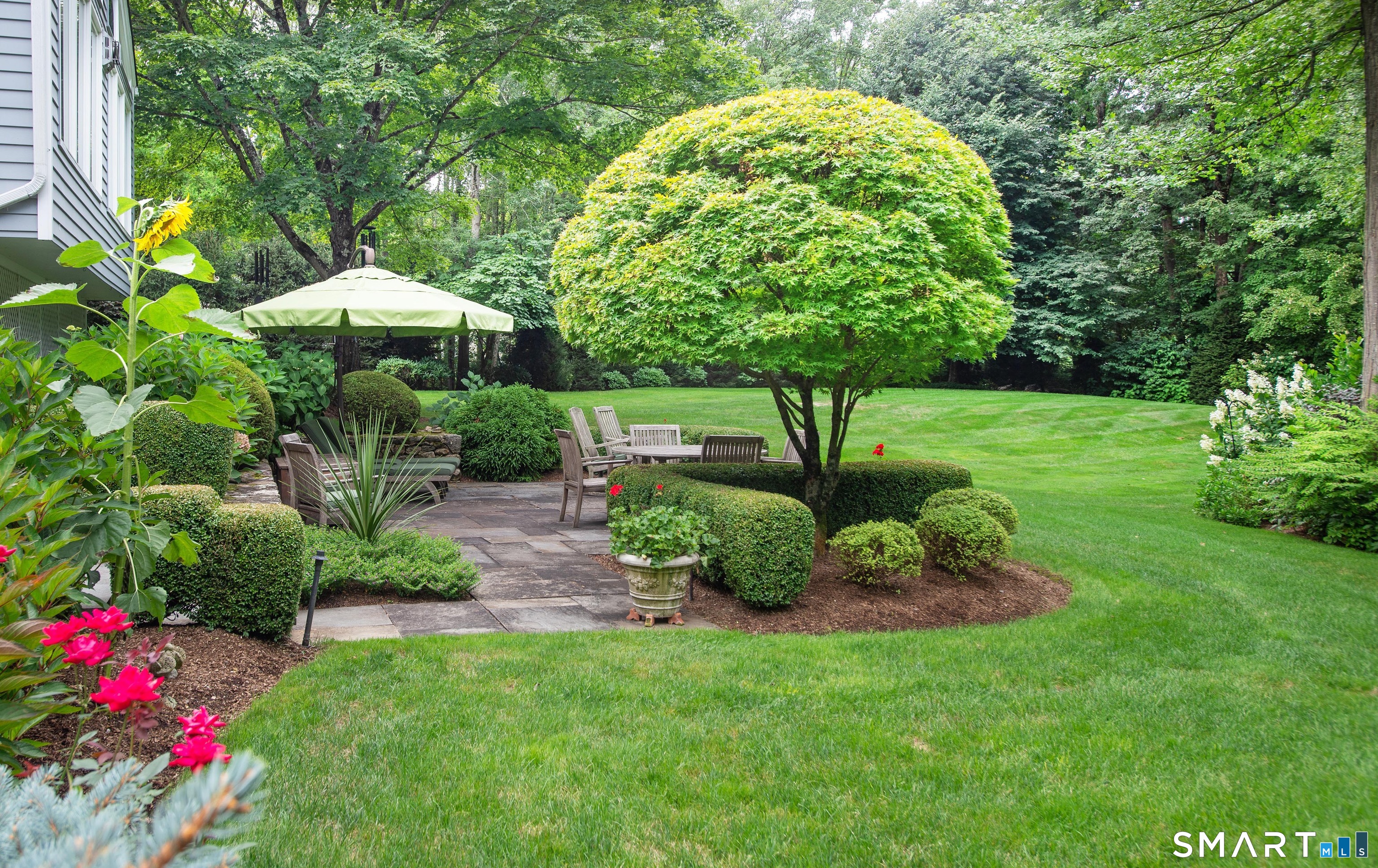15 Twopence Road Ridgefield, CT 06877 - Photo 32 of 42 a view of a garden with a slide