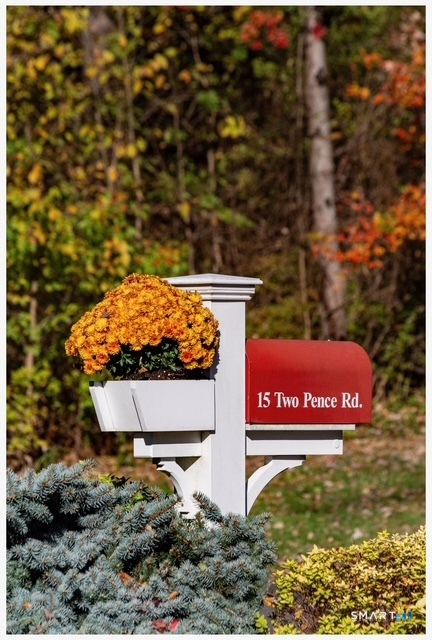 15 Twopence Road Ridgefield, CT 06877 - Photo 36 of 42 a sign that is sitting on a brick wall