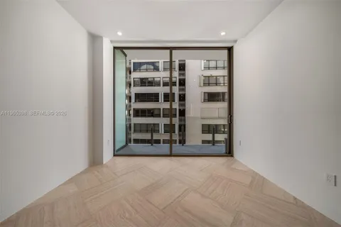 a view of an empty room with a empty shelves