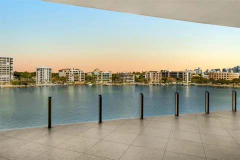 a view of a lake with a city