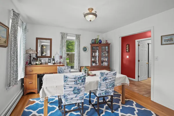 a view of a dining room with furniture
