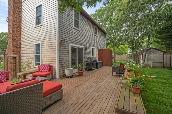 a backyard of a house with seating space