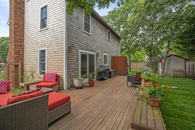a backyard of a house with seating space