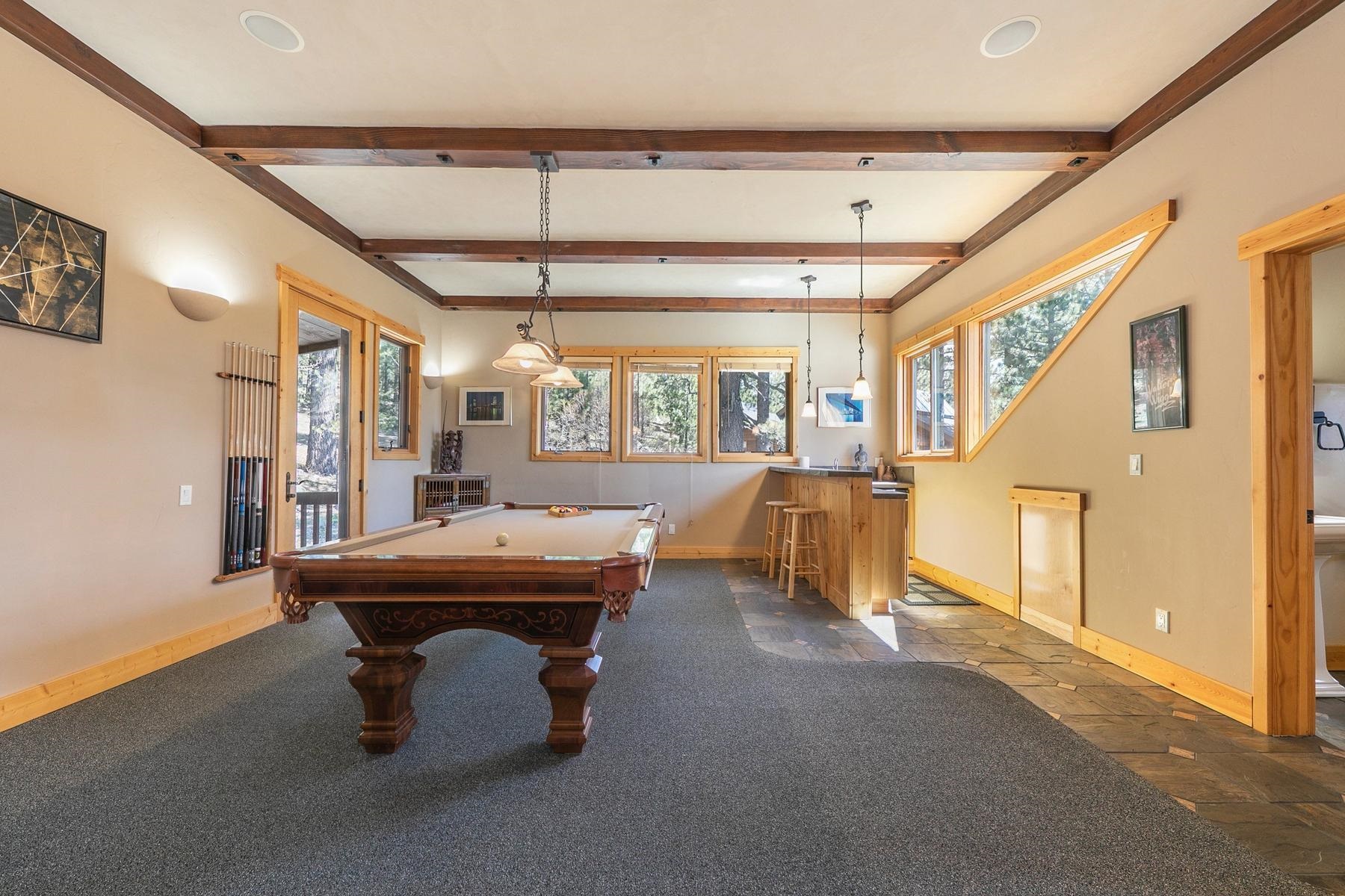 14070 Alder Creek Road Truckee, CA 96161 - Photo 8 of 28 a dining room with furniture and a table