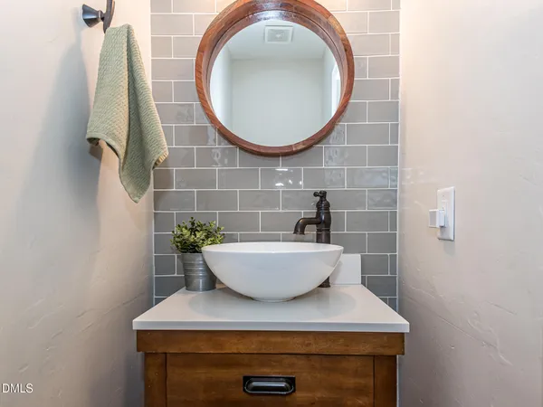a view of a living room and hardwood floor