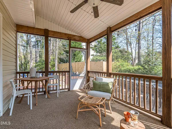 a view of an entryway with wooden floor and stairs