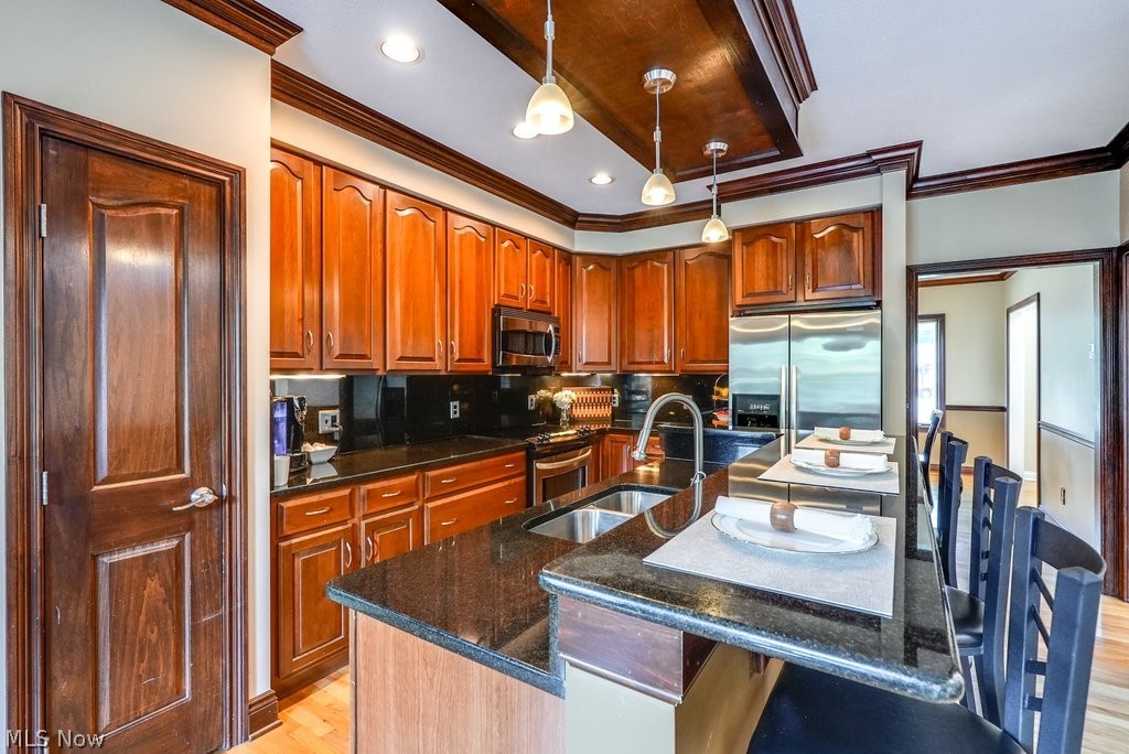 391 Barlow Road Hudson, OH 44236 - Photo 17 of 50 A kitchen island and designated pantry are two convenient features of this delightful kitchen.