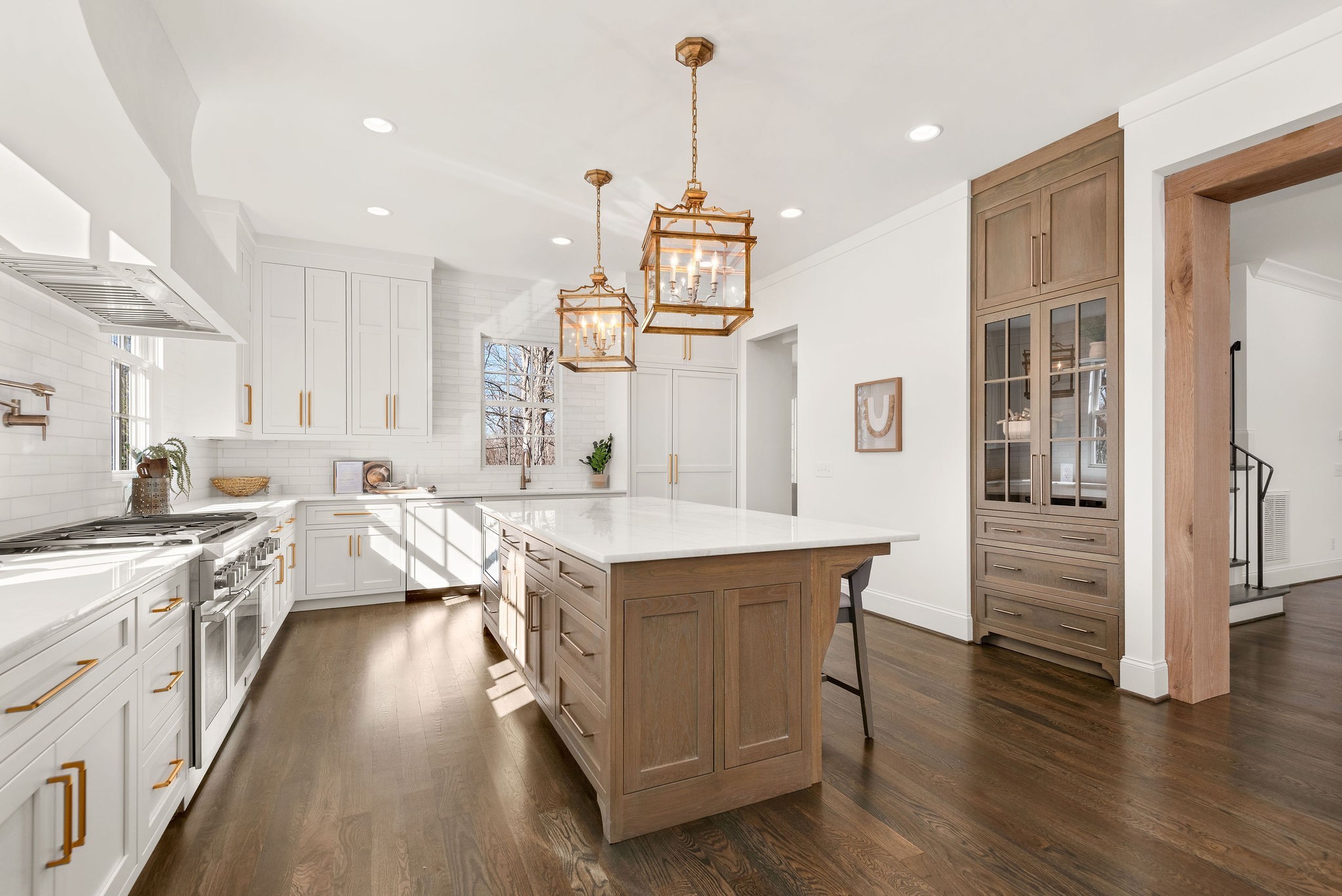 4338 Sneed Road Nashville, TN 37215 - Photo 3 of 46 a kitchen with stainless steel appliances granite countertop a sink stove and wooden floor