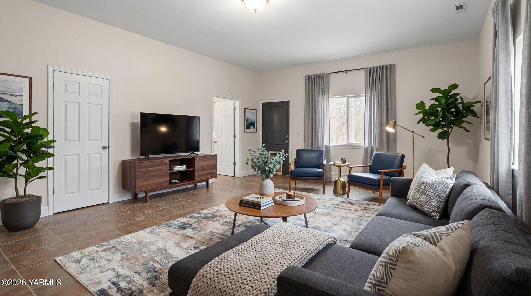 1575 Nile Road Naches, WA 98937 - Photo 6 of 51 a living room with furniture and a flat screen tv
