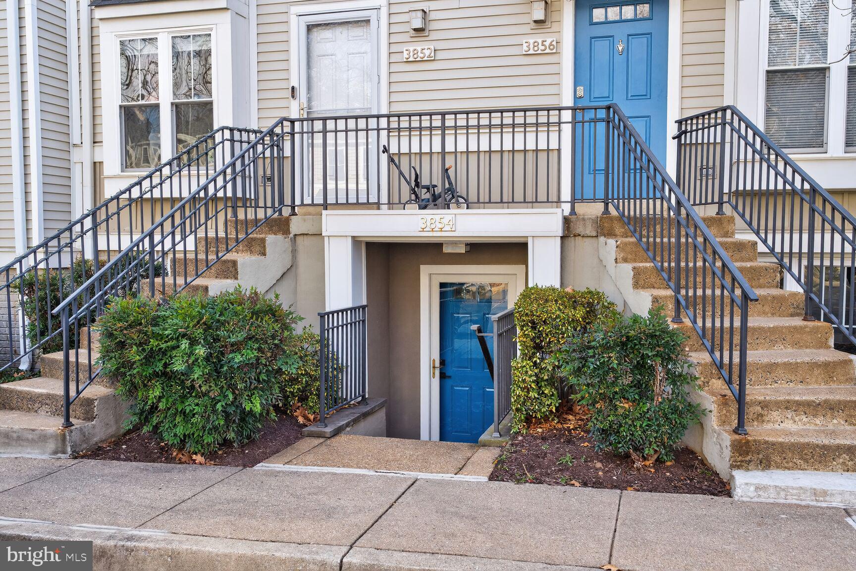 3854 9th Road South, Unit 3854 Arlington, VA 22204 - Photo 2 of 31 a view of a house with a small yard and plants