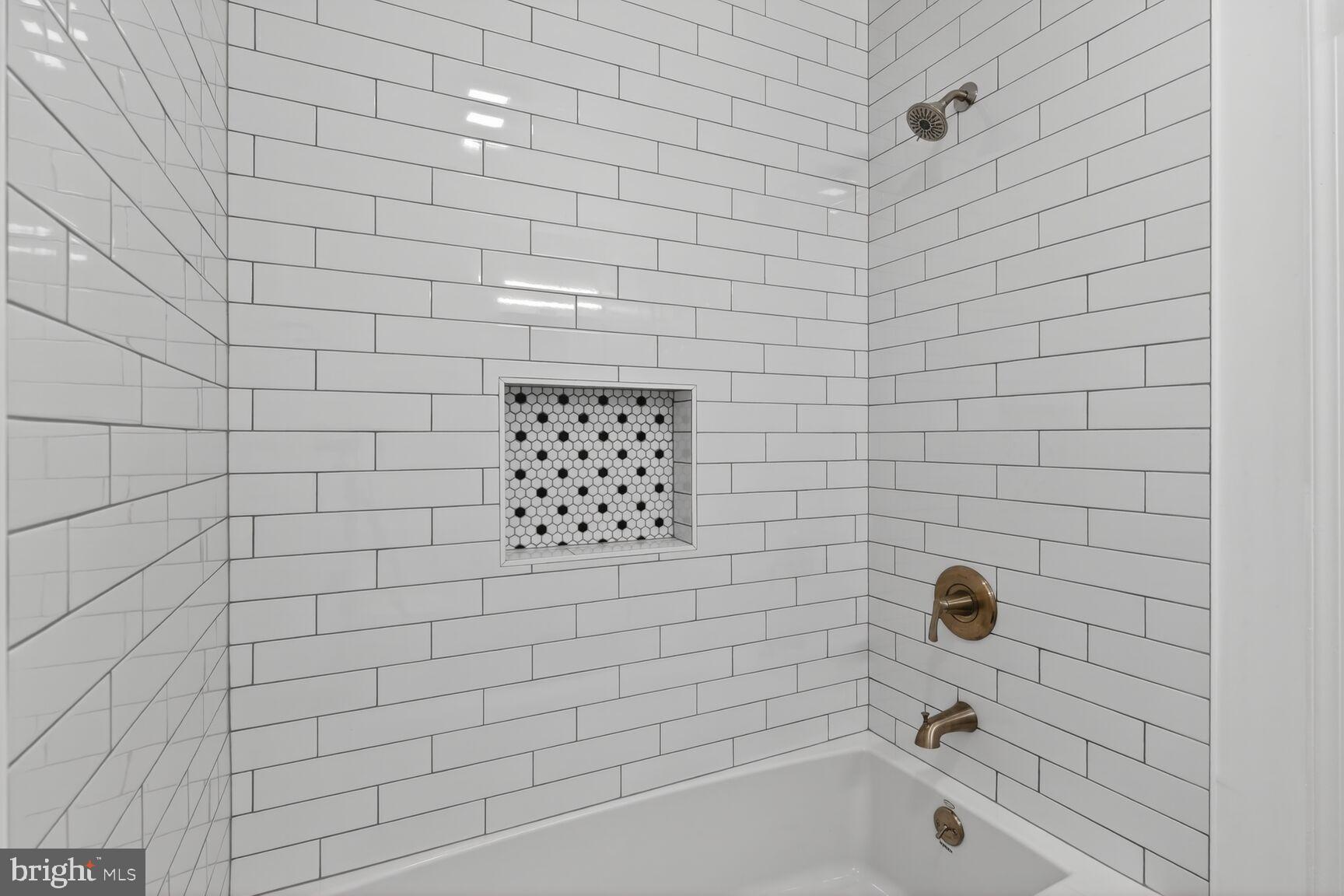 3854 9th Road South, Unit 3854 Arlington, VA 22204 - Photo 26 of 31 a bathroom with a bathtub and shower