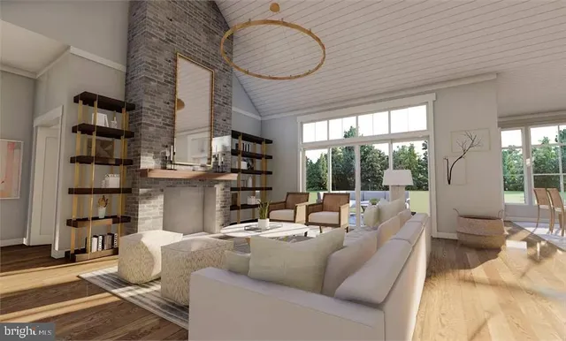 a living room with fireplace furniture and a table