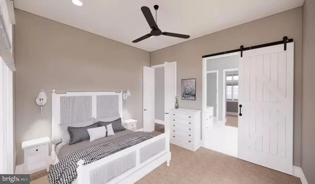 a bedroom with a bed and a cabinets