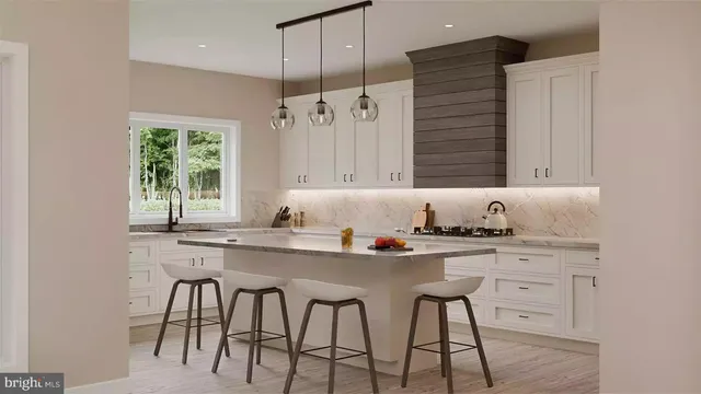 a living room with couches a fireplace and a flat screen tv