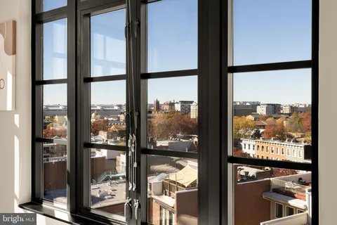 a view of a balcony with city view