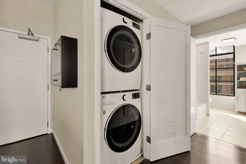 a view of a bath tub and shower