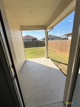 a view of house with yard
