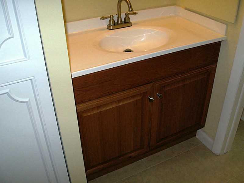 3750 Inverrary Drive, Unit 2Q Lauderhill, FL 33319 - Photo 4 of 16 a bathroom with a sink and a mirror