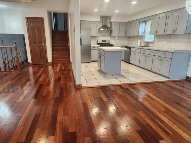 a large kitchen with cabinets